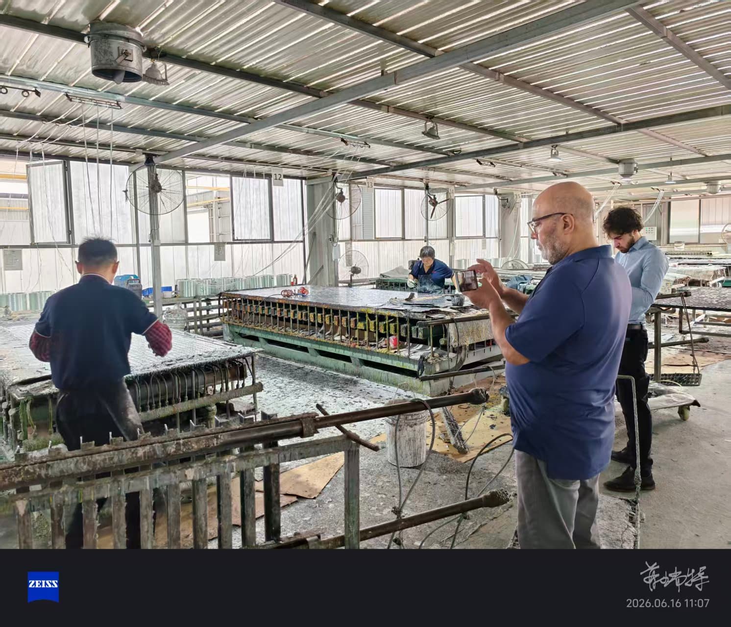 European customers observing FRP pultrusion manufacturing process European customers observing FRP pultrusion manufacturing process